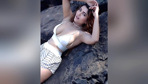 Busty redhead amateur girl has a hot sex in the beach