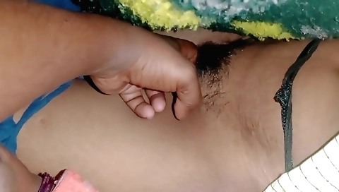 Young teen shows off hairy pussy in a fetish video
