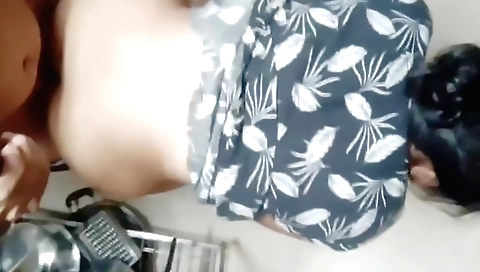 Amateur brunette teen with a shaved pussy in kitchen