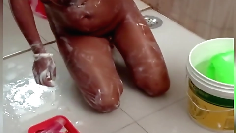 Sexy brunette is getting off by herself in the shower