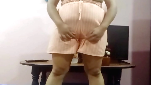 Chubby brunette naked and masturbating in solo video