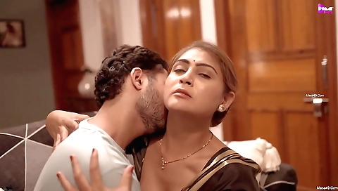 A nice mature woman is on the bed and her ass is rubbed