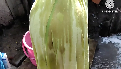 Anita ki is in a bath and stripping off her clothes