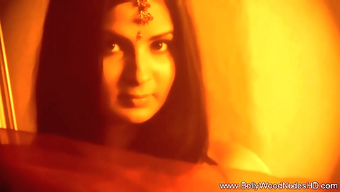 Indian brunette is touching her pussy with her hands