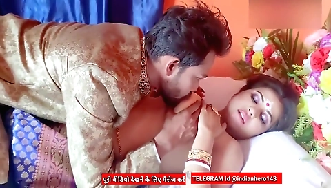 A sexy indian brunette in a black dress and stockings