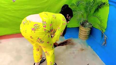 A brunette hobbified slut is stripping and she has sex with herself