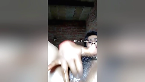 Solo female is fingering her hairy pussy in her sexy outfit