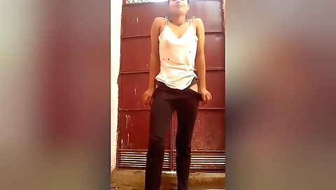 Busty brunette in her village shows off her booty and pussy