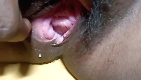 Sexy brunette masturbating with a dildo in her pussy