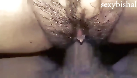 Indian hottie enjoys her hairy pussy in an amateur pov video