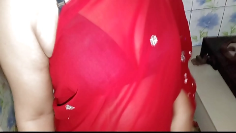 Indian wife was working in the kitchen with her husband