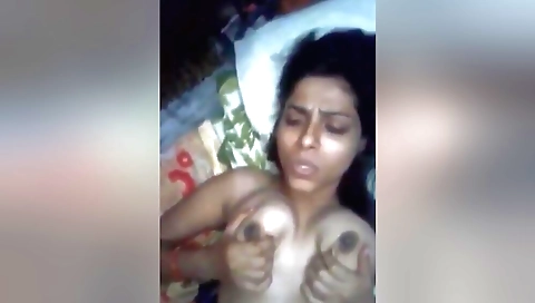 Busty indian slut fucks her own pussy in amateur video