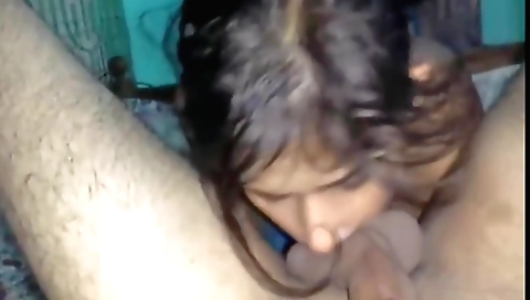 Indian girl sucking her boyfriend's dick and giving him a blowjob