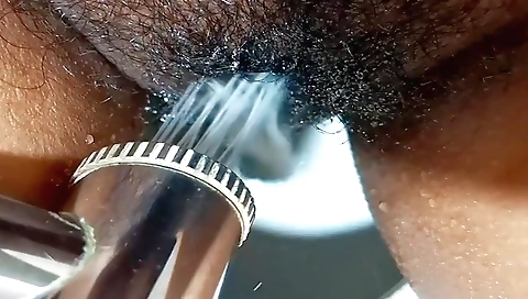 Hot brunette in a sexy white dress is alone in bathroom