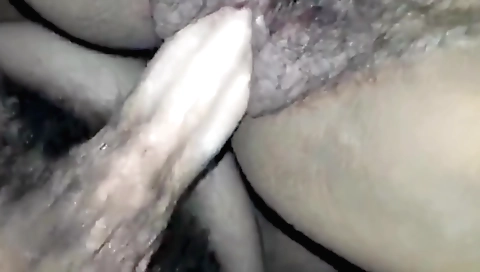 Mature brunette with a hairy pussy gets a large vibrator