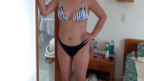 amateur video with a petite brunette naked in the beach