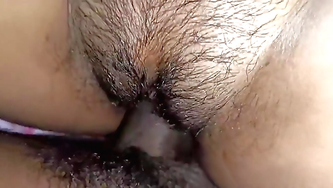 Hairy pussy enjoying a closeup blowjob and a dick penetration