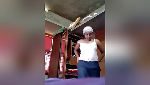 Indian brunette playing with her dress and clothes today